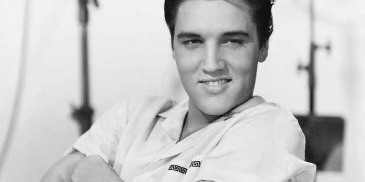 Only Elvis waist up was shown that night